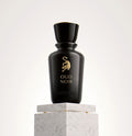 Black perfume bottle for Laverne Oud Noir with a gold leopard logo, sitting on a white marble pedestal